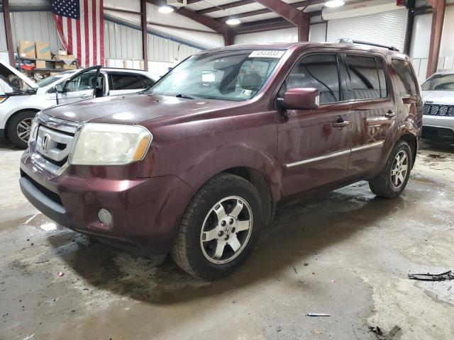 HONDA PILOT TOUR 2011 with VIN 5FNYF4H92BB060586 - Photo from auction
