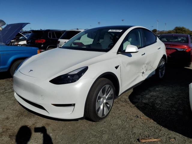 TESLA MODEL Y 2023 with VIN 7SAYGDEE5PF743617 - Photo from auction