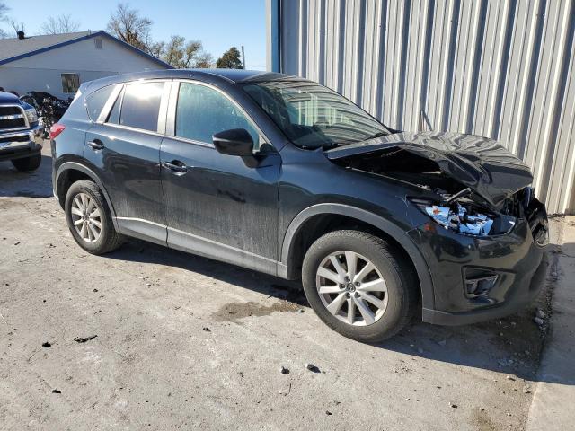 Photo 4 from auction – 2016 MAZDA CX-5 TOURI with VIN JM3KE2CY3G0635030