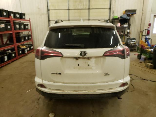 Photo 6 from auction – 2017 TOYOTA RAV4 LE with VIN JTMBFREV9HJ715719