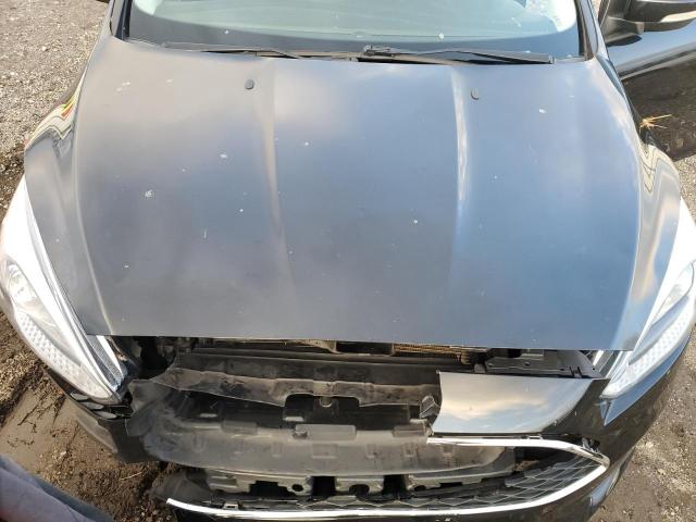 Photo 11 from auction – 2015 FORD FOCUS SE with VIN 1FADP3K20FL304780