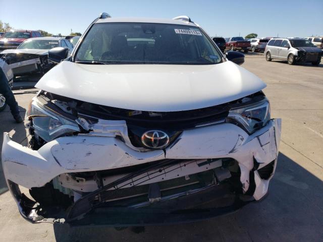Photo 5 from auction – 2017 TOYOTA RAV4 LE with VIN JTMZFREV8HJ130791