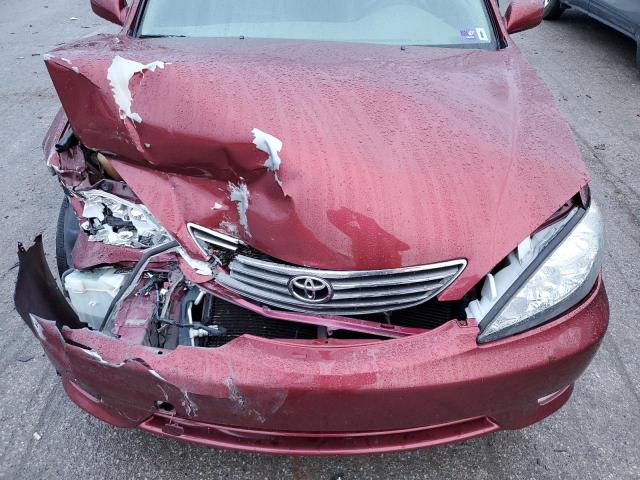 Photo 11 from auction – 2005 TOYOTA CAMRY LE with VIN JTDBF30KX50164535