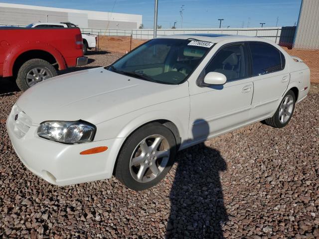 NISSAN MAXIMA GLE 2000 with VIN JN1CA31A4YT014581 - Photo from auction