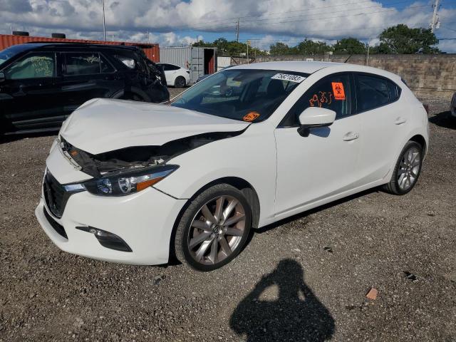 MAZDA 3 TOURING 2017 with VIN 3MZBN1L70HM126549 - Photo from auction