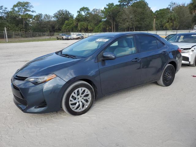 TOYOTA COROLLA L 2018 with VIN 5YFBURHE5JP852997 - Photo from auction