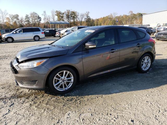 FORD FOCUS SE 2015 with VIN 1FADP3K21FL381674 - Photo from auction