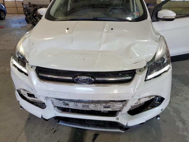 Photo 12 from auction – 2014 FORD ESCAPE TIT with VIN 1FMCU9J95EUB94684