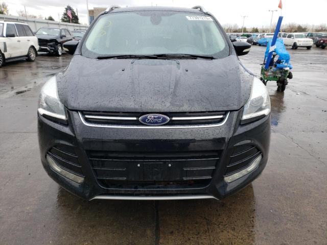 Photo 5 from auction – 2016 FORD ESCAPE TIT with VIN 1FMCU9J99GUB72190