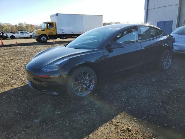 TESLA MODEL 3 2023 with VIN 5YJ3E1EA7PF642121 - Photo from auction