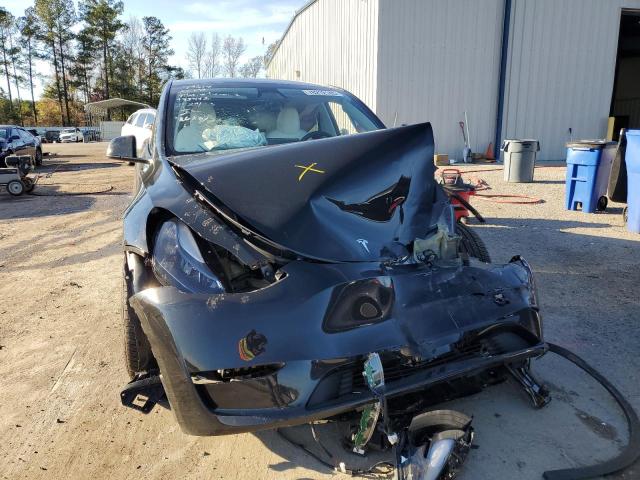 Photo 11 from auction – 2023 TESLA MODEL Y with VIN 7SAYGDEF2PF795442