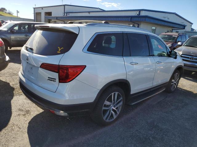 Photo 3 from auction – 2018 HONDA PILOT TOUR with VIN 5FNYF6H97JB019977