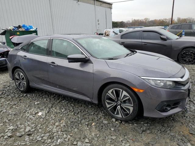 Photo 4 from auction – 2017 HONDA CIVIC EX with VIN 19XFC1F34HE212461