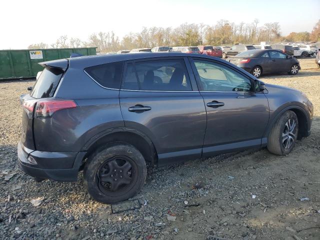 Photo 3 from auction – 2018 TOYOTA RAV4 LE with VIN JTMBFREV3JJ215495