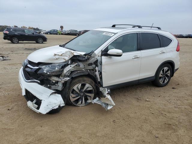 HONDA CR-V TOURI 2016 with VIN 5J6RM4H97GL059541 - Photo from auction