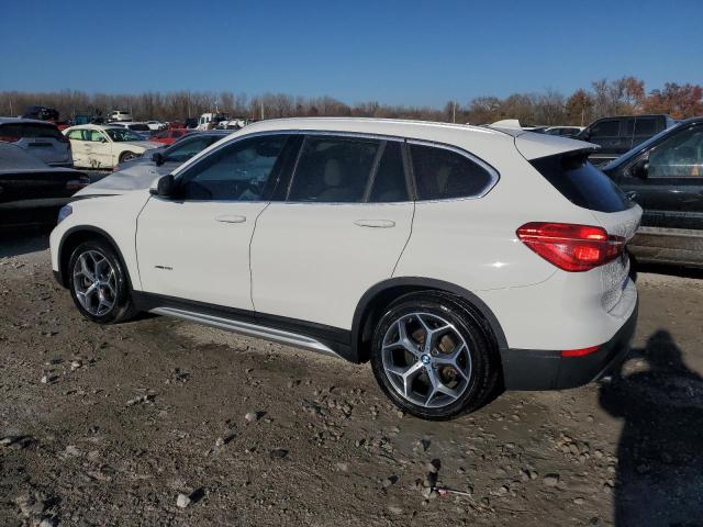 Photo 2 from auction – 2018 BMW X1 XDRIVE2 with VIN WBXHT3C39J5K22867