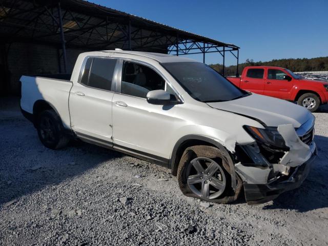 Photo 4 from auction – 2021 HONDA RIDGELINE with VIN 5FPYK3F51MB025490