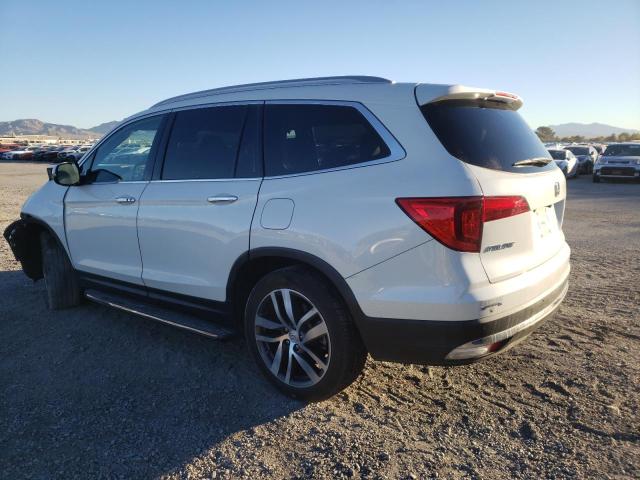 Photo 2 from auction – 2017 HONDA PILOT TOUR with VIN 5FNYF5H93HB002632