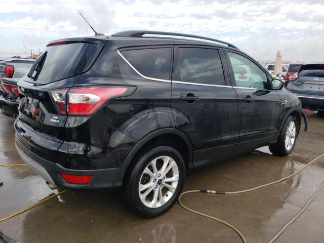 Photo 3 from auction – 2017 FORD ESCAPE SE with VIN 1FMCU9GD1HUA74395