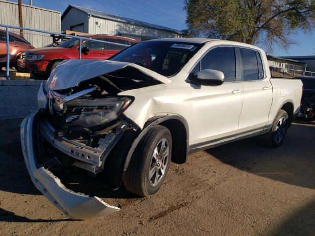 HONDA RIDGELINE 2017 with VIN 5FPYK3F52HB016609 - Photo from auction