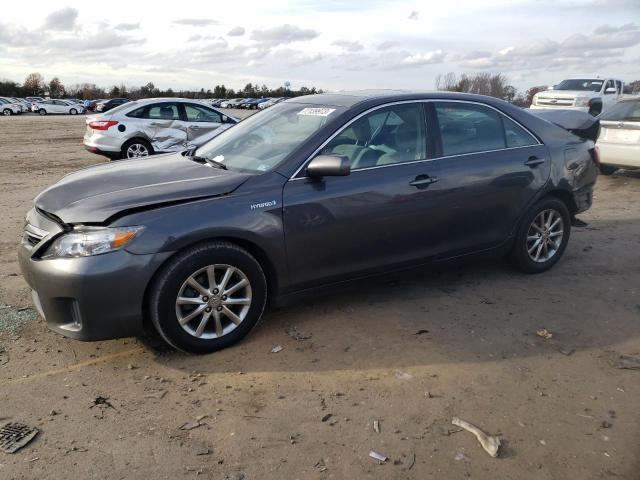 TOYOTA CAMRY HYBR 2011 with VIN 4T1BB3EK5BU131964 - Photo from auction