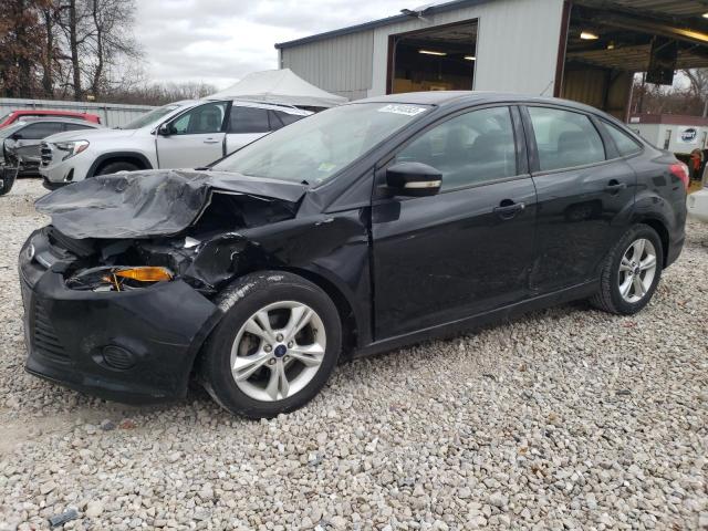 FORD FOCUS SE 2014 with VIN 1FADP3F21EL372854 - Photo from auction