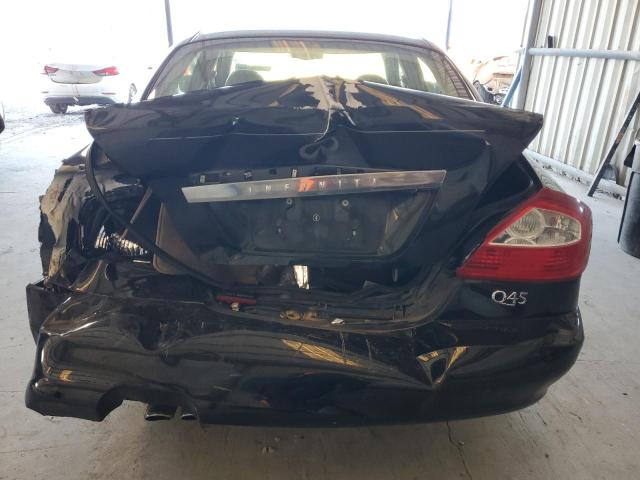 Photo 6 from auction – 2002 INFINITI Q45 with VIN JNKBF01A32M005105