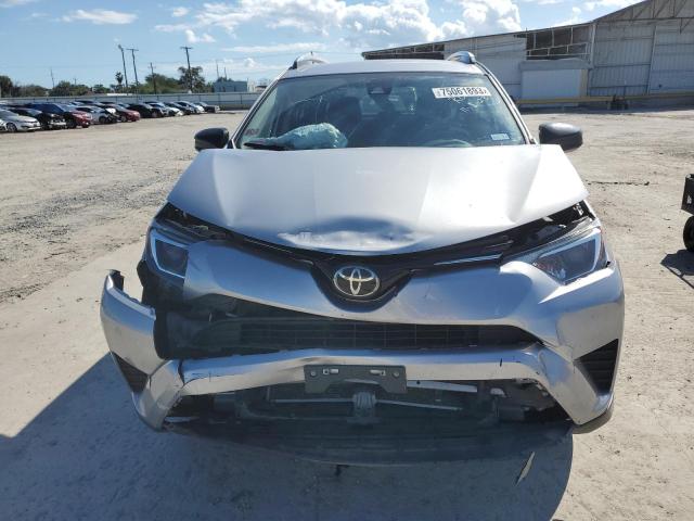 Photo 5 from auction – 2018 TOYOTA RAV4 LE with VIN JTMZFREV3JJ170959