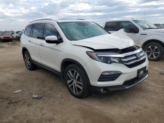 Photo 4 from auction – 2016 HONDA PILOT ELIT with VIN 5FNYF6H08GB124263