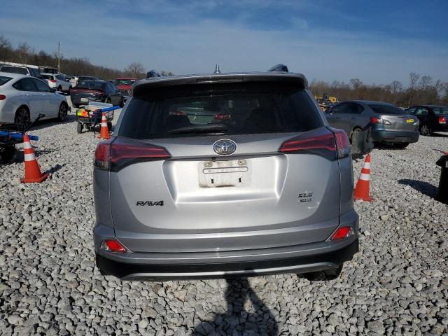 Photo 6 from auction – 2017 TOYOTA RAV4 XLE with VIN 2T3RFREV9HW690420