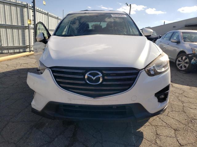 Photo 5 from auction – 2016 MAZDA CX-5 TOURI with VIN JM3KE2CY1G0704989