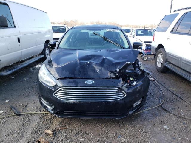 Photo 5 from auction – 2016 FORD FOCUS TITA with VIN 1FADP3J29GL281079