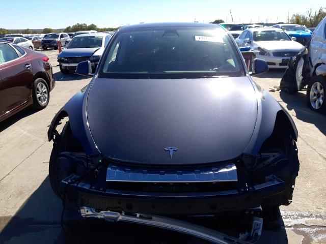 Photo 5 from auction – 2023 TESLA MODEL Y with VIN 7SAYGDEE7PA059035