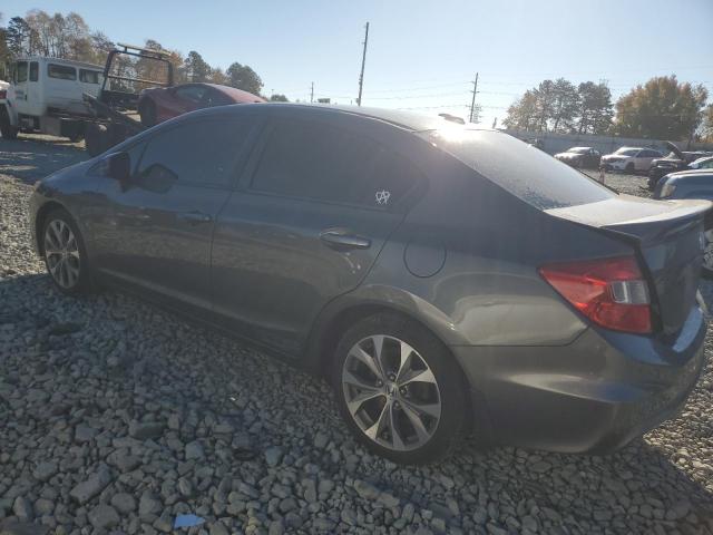 Photo 2 from auction – 2012 HONDA CIVIC SI with VIN 2HGFB6E54CH700133