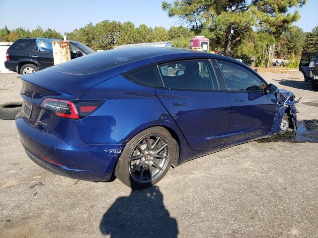 Photo 3 from auction – 2021 TESLA MODEL 3 with VIN 5YJ3E1EB7MF052957