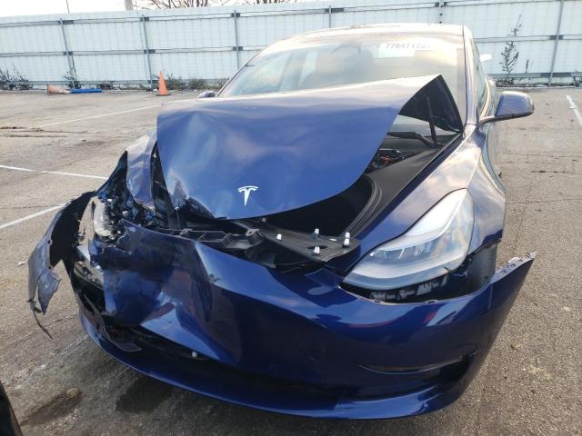 Photo 5 from auction – 2022 TESLA MODEL 3 with VIN 5YJ3E1EB9NF329898