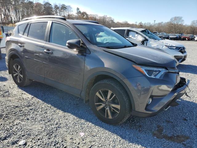 Photo 4 from auction – 2017 TOYOTA RAV4 XLE with VIN 2T3RFREV8HW556160