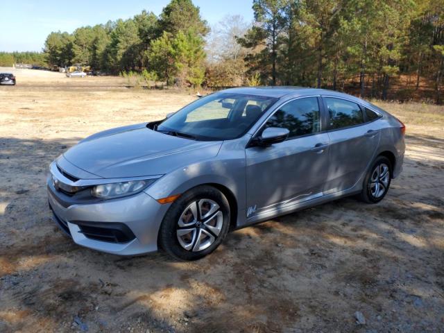 HONDA CIVIC LX 2018 with VIN 19XFC2F59JE002306 - Photo from auction