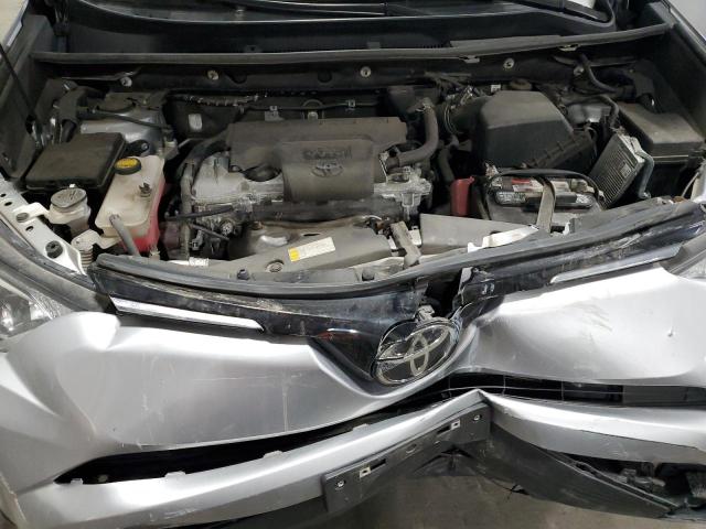 Photo 11 from auction – 2018 TOYOTA RAV4 LE with VIN 2T3BFREV2JW713432