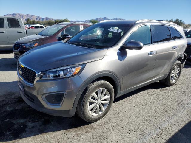 KIA SORENTO LX 2016 with VIN 5XYPG4A32GG004551 - Photo from auction