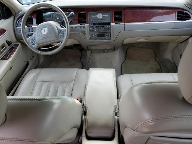 Photo 8 from auction – 2004 LINCOLN TOWN CAR E with VIN 1LNHM81W24Y653831