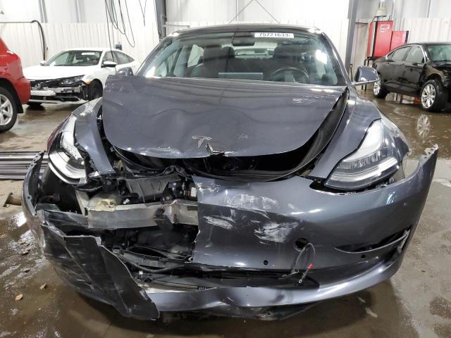 Photo 5 from auction – 2018 TESLA MODEL 3 with VIN 5YJ3E1EB3JF130422