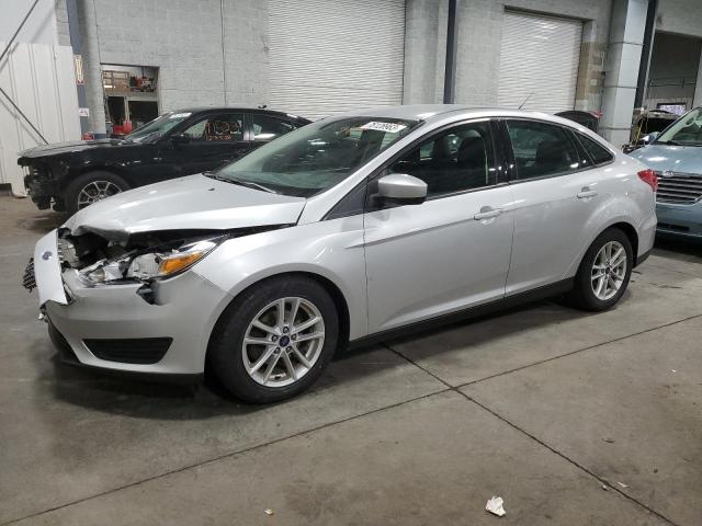 FORD FOCUS SE 2018 with VIN 1FADP3FE5JL223741 - Photo from auction
