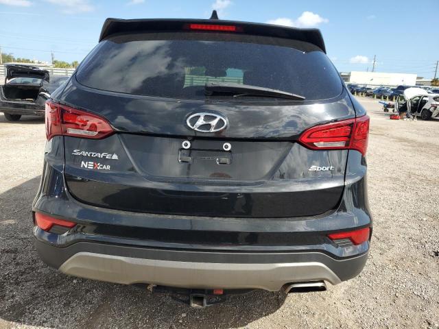 Photo 6 from auction – 2017 HYUNDAI SANTA FE S with VIN 5NMZU3LB2HH028632