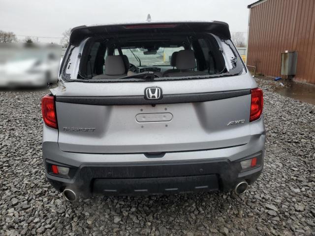 Photo 6 from auction – 2022 HONDA PASSPORT E with VIN 5FNYF8H50NB018734