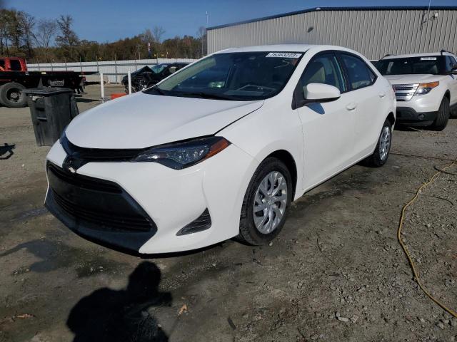 TOYOTA COROLLA L 2019 with VIN 5YFBURHE2KP921209 - Photo from auction