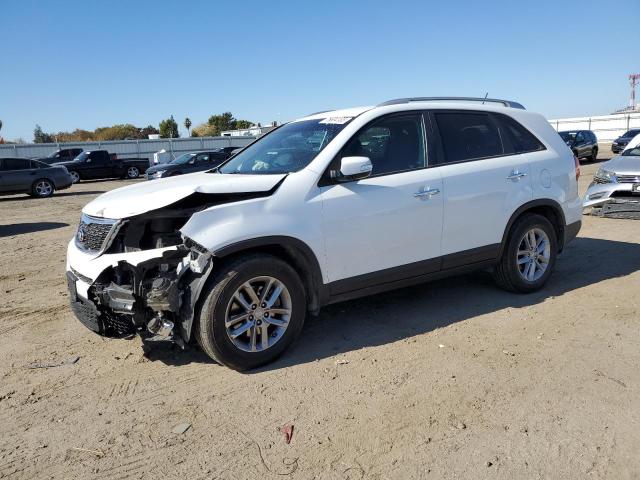 KIA SORENTO LX 2015 with VIN 5XYKT4A71FG602928 - Photo from auction