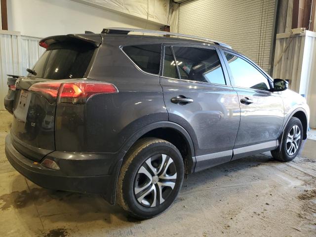 Photo 3 from auction – 2018 TOYOTA RAV4 LE with VIN JTMZFREV5JJ728052