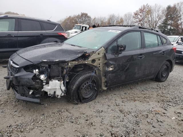 SUBARU IMPREZA 2020 with VIN 4S3GTAA63L1700284 - Photo from auction