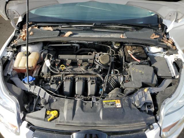 Photo 11 from auction – 2014 FORD FOCUS TITA with VIN 1FADP3N23EL188937